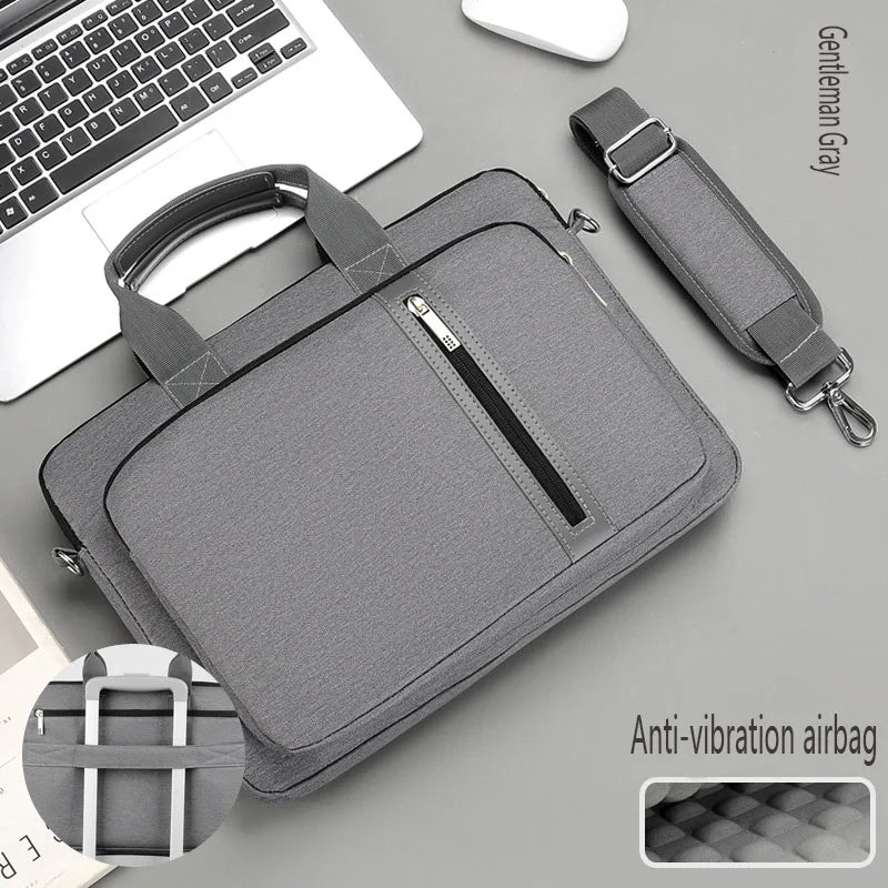Interior view of the portable laptop bag showing padded compartment and accessory pockets.